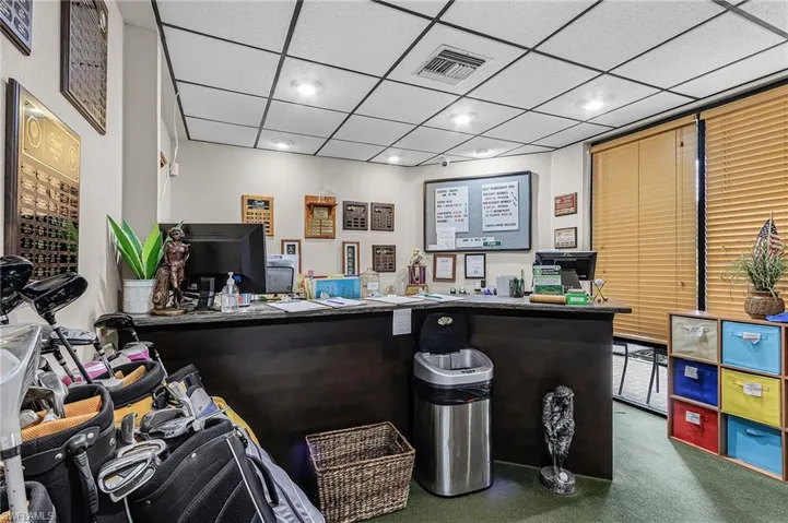 Golf pro shop featuring a drop ceiling