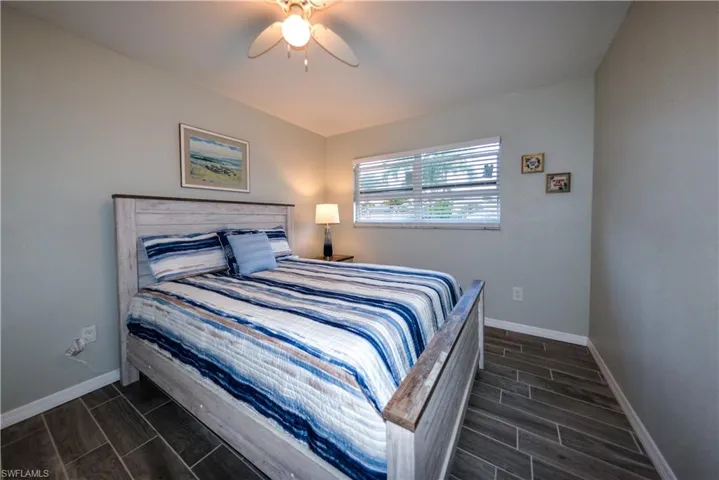 Secondary bedroom with porcelain tile floor