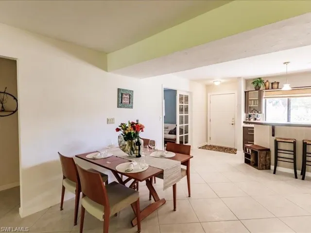 Dining room featuring light tile floors