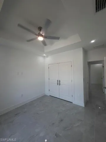 Recessed ceiling with an integrated ceiling fan and lighting fixture