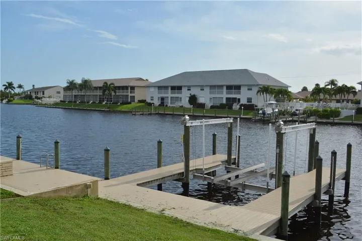View of dock  with a water view