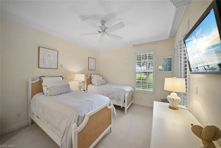 Comfortable and airy second bedroom providing bright interiors