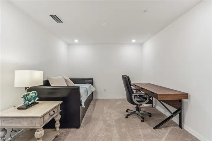 Bedroom featuring carpet