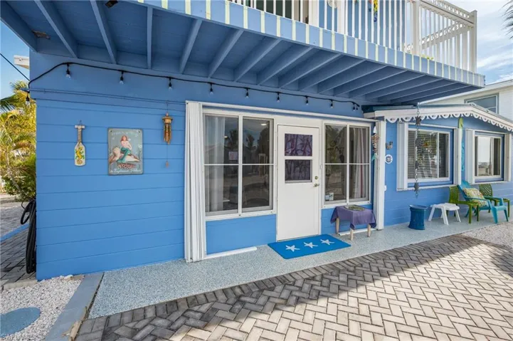 Entrance to property with a patio