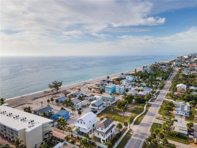 Aerial view of residential area with extended coastline