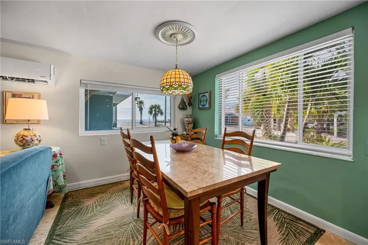 Dining space featuring a mini split for heating / cooling and baseboards
