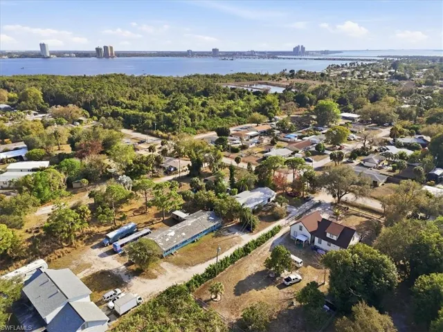 Aerial view of residential area with a large body of water