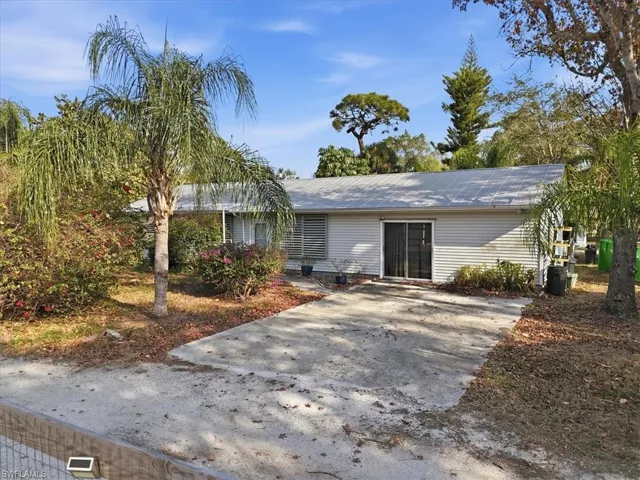 Single story home with a metal roof