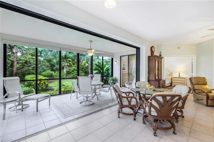 Welcome to your private oasis in the gorgeous Oakwood Villa community of Bonita Bay!