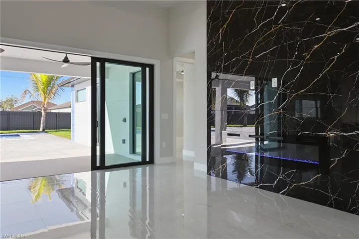 12-foot quartz wall with built-in fireplace