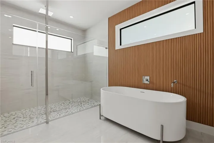 Deep stand alone tub and shower