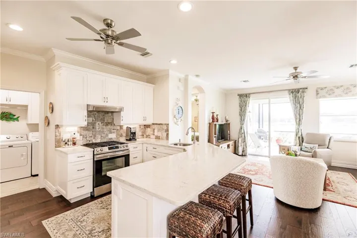 Updated kitchen flows into living area