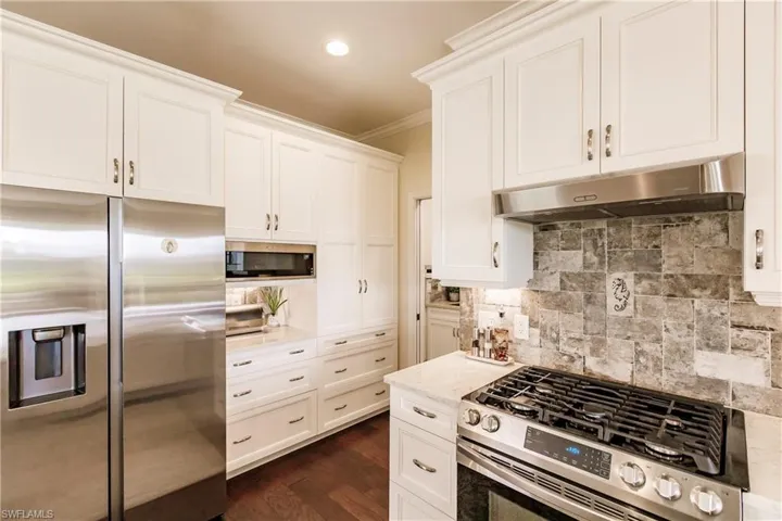 Custom backsplash and storage drawers!
