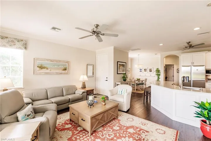 View of the living room, dining area and kitchen