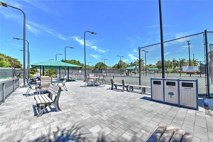 View of property's community featuring fence