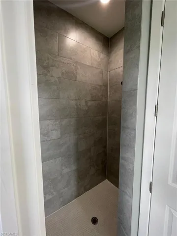 Bathroom with tiled shower