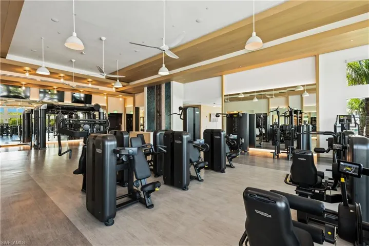 Workout area featuring a high ceiling