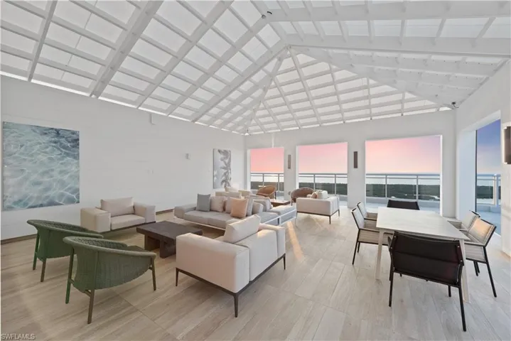 Living area featuring a high ceiling