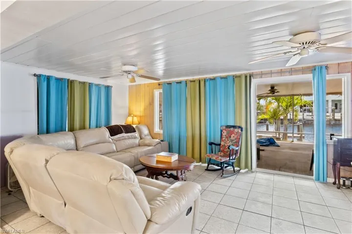 Spacious interior living area with potential to update.
