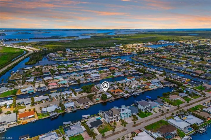 Largest lot in the area with wide-open waterfront views.