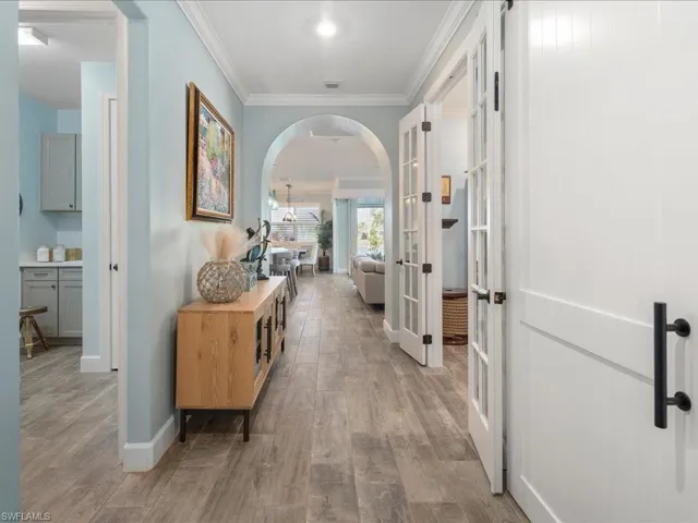The entryway opens to a Hallway after a custom "drop zone"