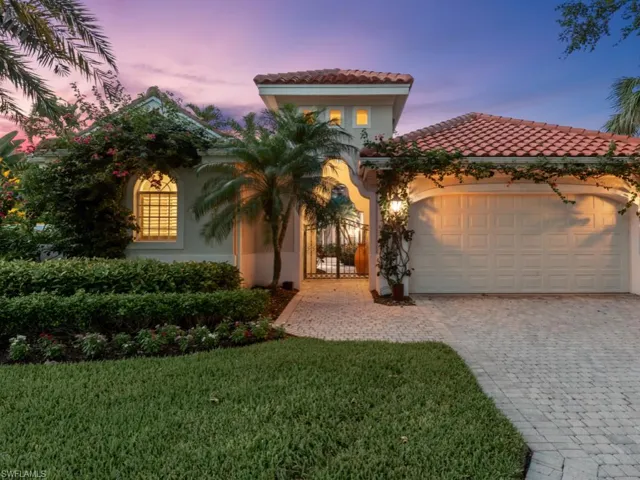 Mediterranean / spanish-style courtyard villa with a 2 car garage