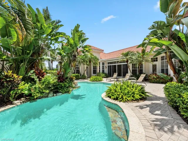 View of swimming pool with lounging area
