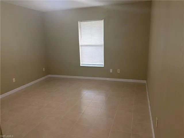 Tiled flooring extending throughout the space