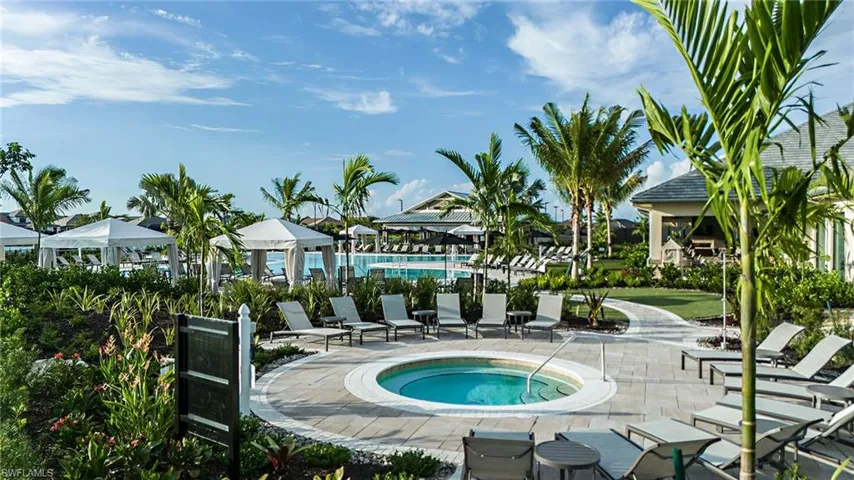 View of swimming pool featuring a gazebo, a hot tub, and a patio area