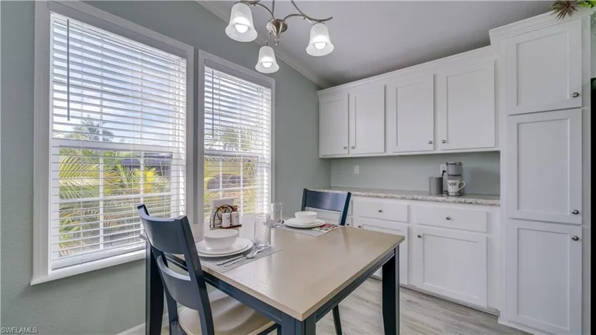 Dining Area with extra counterspace and cabinetry