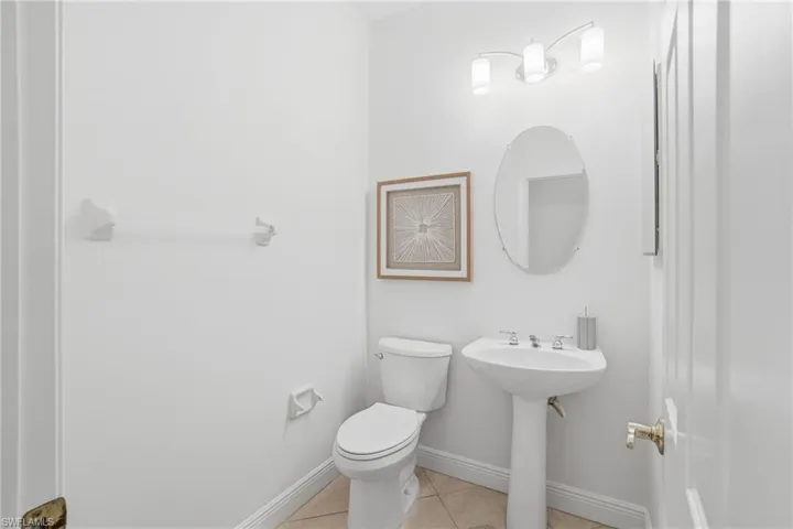 3rd bath is a guest powder accessible for guests, the pool area, and den for privacy and comfortability.