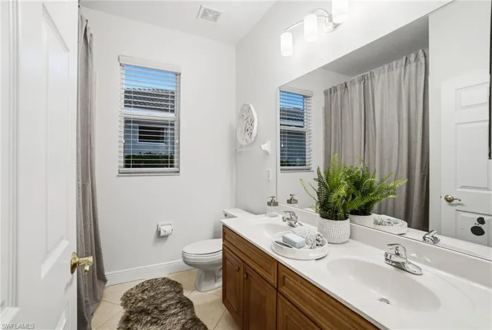 Adjacent 2nd bathroom is positioned between bedroom 2 and 3.