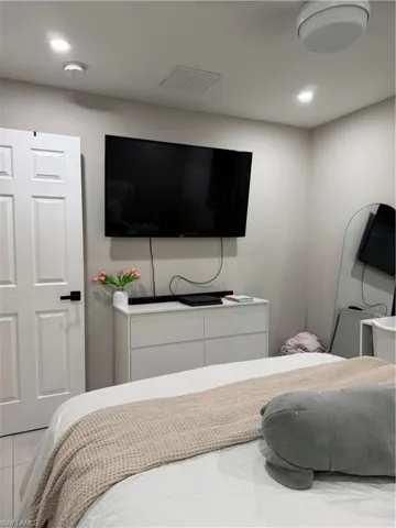 Bedroom with recessed lighting