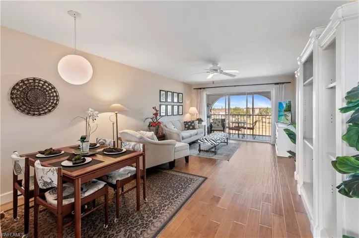 Dining room and living room, wood floors.