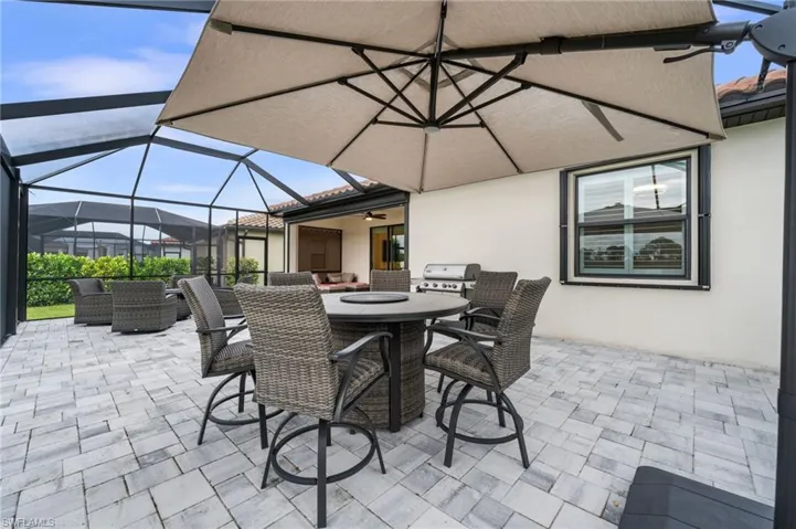 View of patio / terrace with glass enclosure and area for grilling