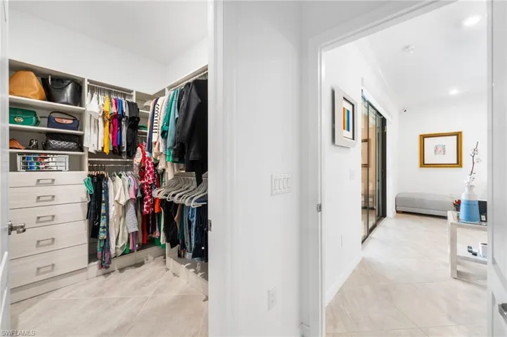 Spacious closet featuring light tile patterned floors
