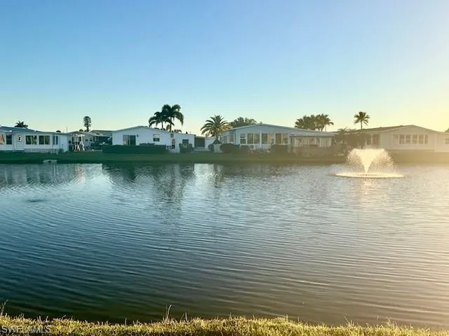 Water view with nearby suburban area