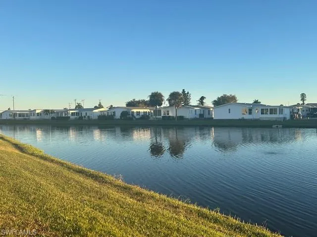 Water view featuring nearby suburban area