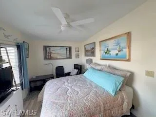 Master Bedroom featuring a ceiling fan and wood-style flooring