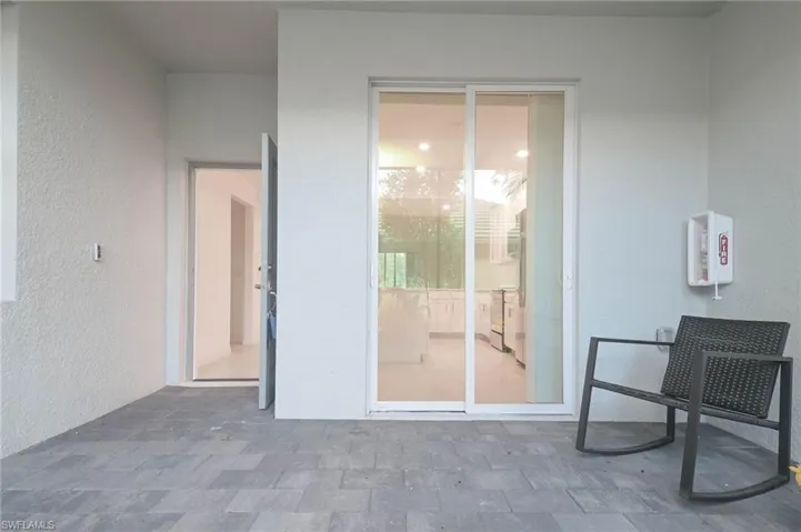 Entrance & slider to front porch
