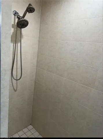 Bathroom with tiled shower