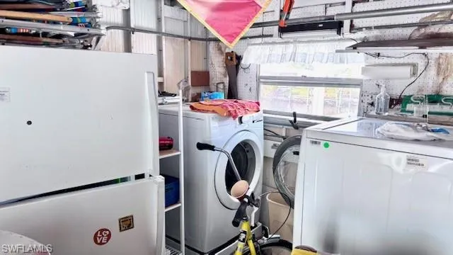Laundry and additional refrigerator in Shed