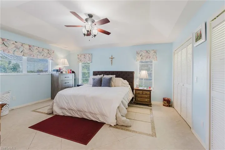 Dining room with vaulted ceiling and a chandelier