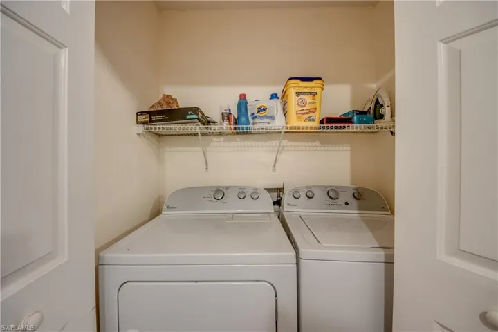 Washroom featuring separate washer and dryer