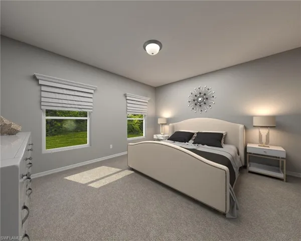 Bedroom featuring carpet flooring