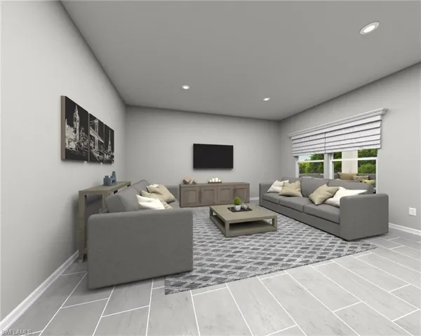 Living room with light hardwood / wood-style flooring
