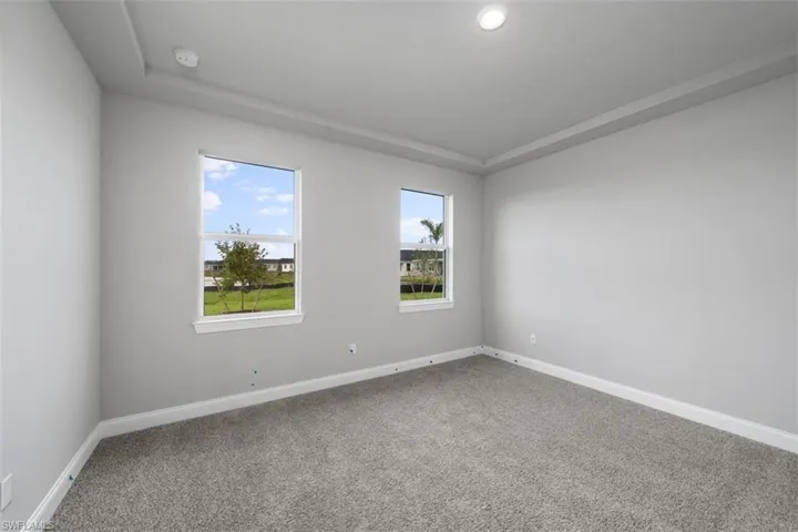 Spare room featuring carpet floors
