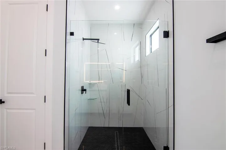 Bathroom featuring an enclosed shower