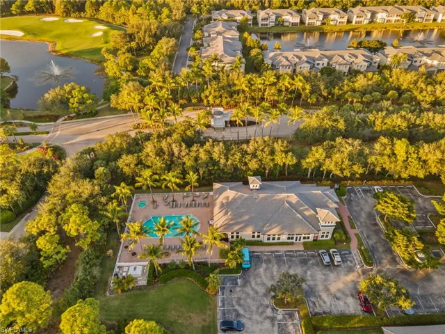 Bird's eye view of a nearby body of water and a local golf course