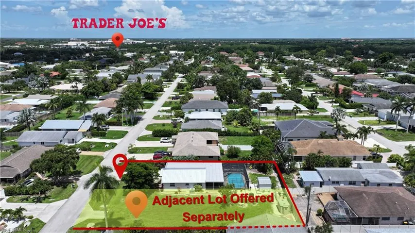 Aerial perspective showcasing a residential neighborhood with a prominent street grid